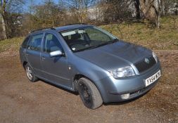 A 2004 SKODA FABIA ELEGANCE TDi FIVE DOOR ESTATE CAR IN GREY, with a 1896cc diesel engine, six speed