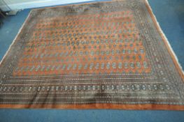 G H FRITH LTD, A PAKISTANI WOOLLEN RUG, with one-hundred and forty-four medallions, surrounded by