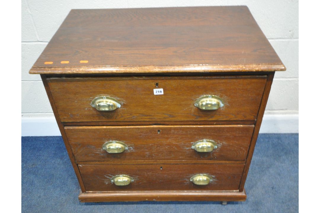 AN EARLY 20TH CENTURY STAINED OAK CHEST OF THREE DRAWERS, raised on castors, width 80cm x depth 52cm - Image 1 of 4