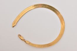 A YELLOW METAL CHAIN BRACELET, a flat link herring bone bracelet, approximate chain width 6mm,