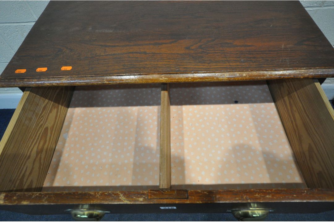 AN EARLY 20TH CENTURY STAINED OAK CHEST OF THREE DRAWERS, raised on castors, width 80cm x depth 52cm - Image 3 of 4