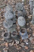 A COLLECTION OF STONE AND CONCRETE POST TOPPERS, along with three small cast iron urns, 22cm high