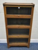 KENRICK AND JEFFERSON, A 20TH CENTURY OAK BOOKCASE, with four glazed hide and fall doors, width 71cm