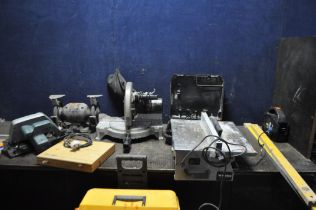 A COLLECTION OF POWER TOOLS including a Wickes compound mitre saw, a Black and Decker circular