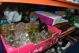 FOUR BOXES AND LOOSE ASSORTED GLASSWARE to include three green glass Empoli style genie bottles of