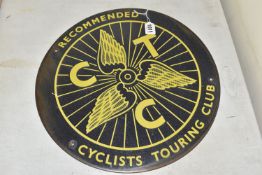 AN EARLY 20TH CENTURY ADVERTISEMENT SIGN, of circular form, CTC- The Cyclists Touring Club was a
