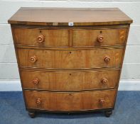 A 19TH CENTURY MAHOGANY BOW FRONT CHEST OF TWO SHORT OVER THREE LONG DRAWERS, raised on turned legs,