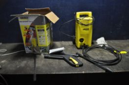 A KARCHER KB2020 PRESSURE WASHER, with original box, lance, two nozzles and a car brush (PAT pass