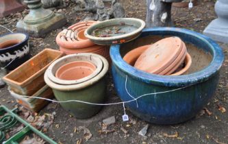 TWENTY MODERN GARDEN PLANT POTS, including a graduated set of five terracotta pots, a large blue/