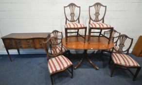 A 20TH CENTURY MAHOGANY DROP LEAF TABLE, raised on a single pedestal, with four splayed legs, open