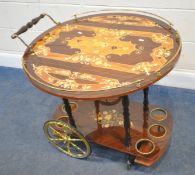 A 20TH CENTURY ITALIAN TWO TIER DROP LEAF TEA TROLLEY, with marquetry inlay, one handle, a brass
