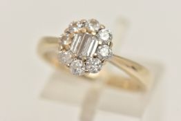 AN 18CT GOLD DIAMOND CLUSTER RING, three baguette cut diamonds and eight round brilliant cut