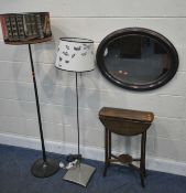 AN OVAL WALL MIRROR, two standard lamps, along with a small drop leaf table, condition report: all