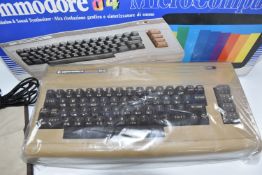 COMMODORE 64 COMPUTER, comes in its original box, untested