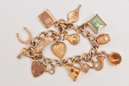 A 9CT GOLD CHARM BRACELET, curb link bracelet, fitted with multiple charms to include a bank note