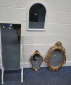 A WHITE PAINTED WROUGHT IRON FLOOR STANDING MIRROR, height 110cm, a gold plastic wall mirror, gilt
