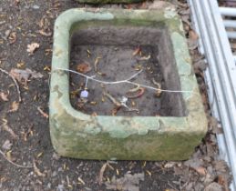 A SANDSTONE TROUGH probably early 20th Century, width 55cm, depth 50cm, height 23cm. Condition
