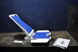 A DRIVE MOBILITY BELLAVITA ELECTRIC BATH SEAT, with manual, charger and remote (PAT pass and
