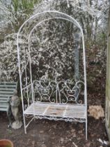A MID CENTURY WROUGHT IRON ARBOUR SEAT, with arched top, steel slatted seat, width 114cm, depth