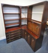 G PLAN, A MAHOGANY CORNER WALL UNIT, fitted with an arrangement of shelves, four drawers, and a fall