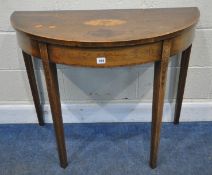 A GEORGIAN MAHOGANY DEMI-LUNE SIDE TABLE, with an oval central inlay, raised on square tapered legs,