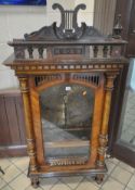 SYMPHONION, A 19TH CENTURY MAHOGANY CASED WIND UP MUSICAL BOX, with a decorative pediment, the
