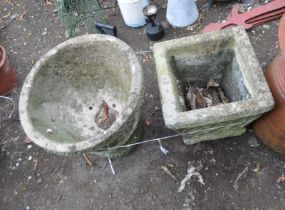 TWO GARDEN PLANTERS, including an early 20th Century reconstituted stone two piece urn, 36cm high,