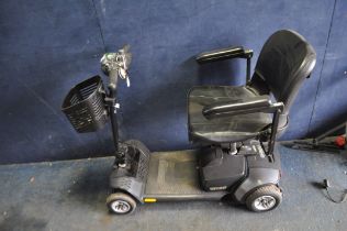 A GOGO ELITE TRAVELLER MOBILITY SCOOTER, with key and charger (PAT pass and working but battery