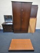 A STAG MINSTREL THREE PIECE BEDROOM SUITE, comprising two wardrobes, width 118cm x depth 61cm x