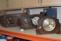 TWO SMALL WALL CLOCKS AND A 1930'S MANTEL CLOCK, comprising two wooden cased wall clocks each with