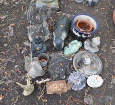 A COLLECTION OF GARDEN ORNAMENTS, including a Buddha figure, a badger, a turtle, a goose, a pair