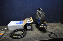 A SGS AIR COMPRESSOR, with various attachment and hose (PAT pass and working but needs adjustment as