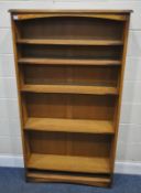AN OAK SHALLOW OPEN BOOKCASE, with five adjustable shelves, width 92cm x depth 25cm x height
