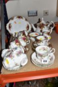 A GROUP OF ROYAL ALBERT TEA WARE, comprising four 'Moss Rose' pattern tea cups (all marked as second