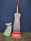 AN ORECK XL COMMERCIAL UPRIGHT VACUUM CLEANER with spare bags (PAT pass and working)
