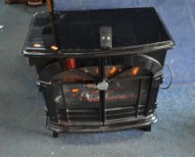 A STOCKBRIDGE DIMPLEX SKB20BLN STOVE EFFECT HEATER in gloss black, with remote, width 63cm, depth