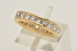 AN 18CT GOLD DIAMOND FULL ETERNITY RING, designed as twenty three princess cut diamonds, channel set