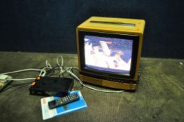 A LATE 20th CENTURY SONY TRINITRON KV-1340UB TV (PAT fail due to uninsulated plug but working)and an