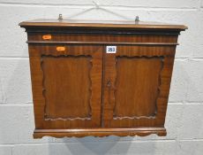 A 20TH CENTURY MAHOGANY WALL HANGING CABINET, the double cupboard doors enclosing two drawers, width
