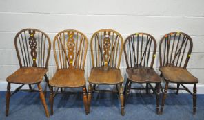 FIVE VARIOUS ELM SEATED CHAIRS, all with hoop backs, three with wheel splat backs, all with dished