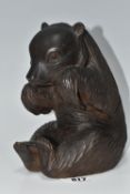 A BLACK FOREST STYLE WOODEN BEAR FIGURE, stamped 'Made in Soviet Union', carved in a seated
