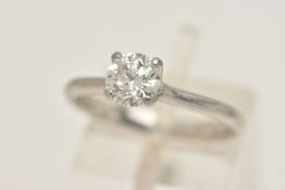 A SINGLE STONE CERTIFIED DIAMOND RING, round hearts and arrows cut diamond prong set in platinum,