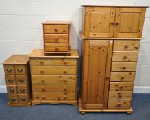 A SELECTION OF MODERN PINE FURNITURE, to include a wardrobe, fitted with three cupboard doors, and