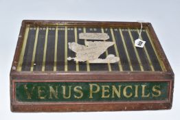 A VENUS PENCILS COUNTER TOP DISPLAY CABINET with a sloped front, drawer opening to the rear (