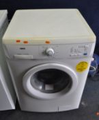 A ZANUSSI ZWF14070W1 WASHING MACHINE, width 60cm, depth 60cm, height 85cm (PAT pass, spin cycle