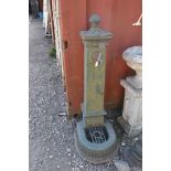 AN EARLY 20th CENTURY CAST IRON DRINKING WATER FOUNTAIN, possibly French with a fanned bronze tap,