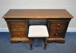 WILLIS AND GAMBIER, A CHERRYWOOD DRESSING TABLE, with seven assorted drawers, length 150cm x depth