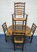 A REPRODUCTION OAK CIRCULAR TABLE, raised on a turned support, with four shaped legs, diameter 106cm