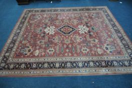 AN OSTA CARPETS QUARTZ LARGE RECTANGULAR WOOLEN RUG, with repeating geometric patterns, a central