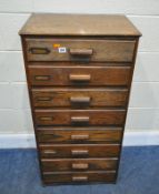 AN EARLY 20TH CENTURY OAK OFFICE CHEST OF EIGHT DRAWERS, width 54cm x depth 39cm x height 108cm,